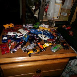 vintage lot of 64 die cast vehicles. mostly hot wheels.